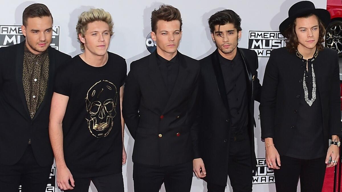 Zayn Malik, second from right, is taking a break from touring with One Direction because of stress. The rest of the band is, from left, Liam Payne, Niall Horan, Louis Tomlinson and Harry Styles.