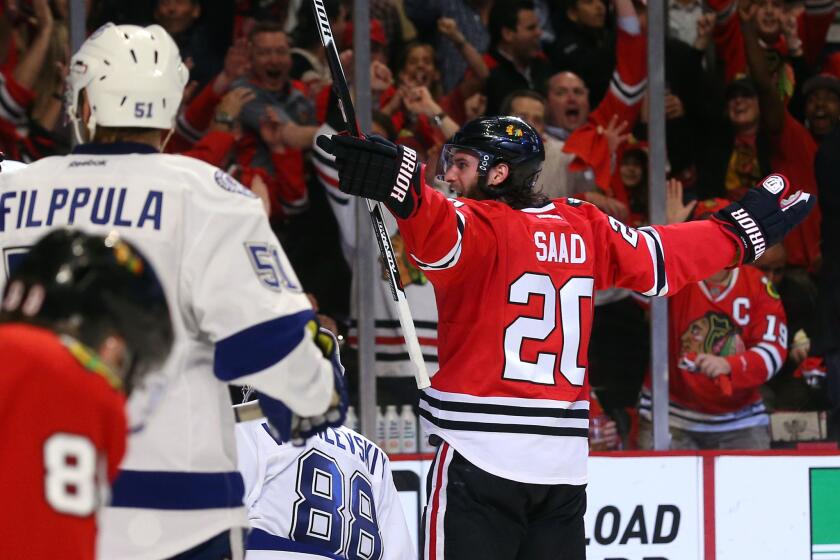 Blackhawks left wing Brandon Saad celebrates after scoring what proved to be the game-winning goal against the Lightning in Game 4 of the Stanley Cup Final on Wednesday night in Chicago.