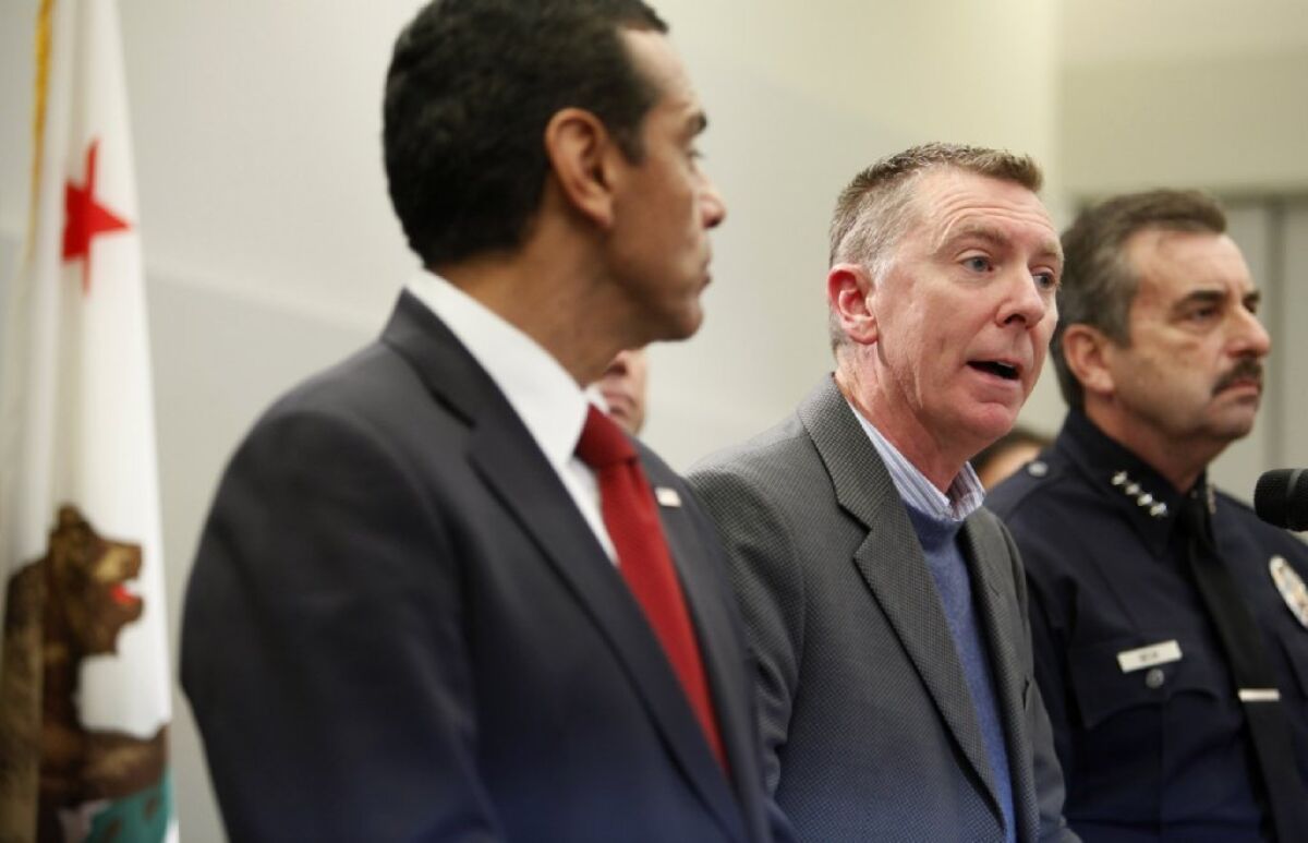L.A. schools Supt. John Deasy, right, appears with L.A. Mayor Antonio Villaraigosa at a downtown news conference on school safety.