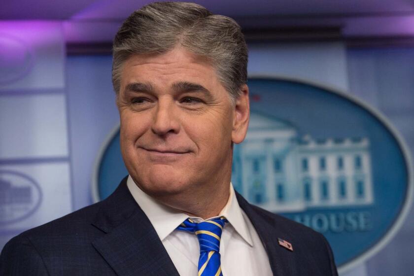 Fox News host Sean Hannity is seen in the White House briefing room in Washington, DC, on January 24, 2017. / AFP / NICHOLAS KAMM (Photo credit should read NICHOLAS KAMM/AFP/Getty Images) ** OUTS - ELSENT, FPG, CM - OUTS * NM, PH, VA if sourced by CT, LA or MoD **