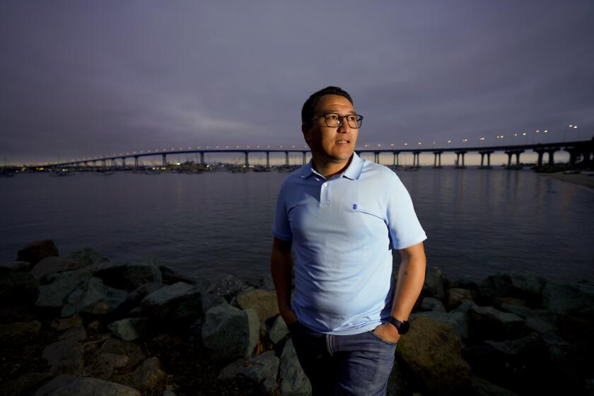San Diego, CA - June 03: On Thursday, June 3, 2021 in Coronado, CA., with San Diego in the background, Rahmat Mokhtar, 34 hopes to soon become a U.S. citizen. Mokhtar worked as translator for the U.S. Army and Marines. In 2016 his visa to travel to the U.S. was approved and he soon arrived in El Cajon. (Nelvin C. Cepeda / The San Diego Union-Tribune)