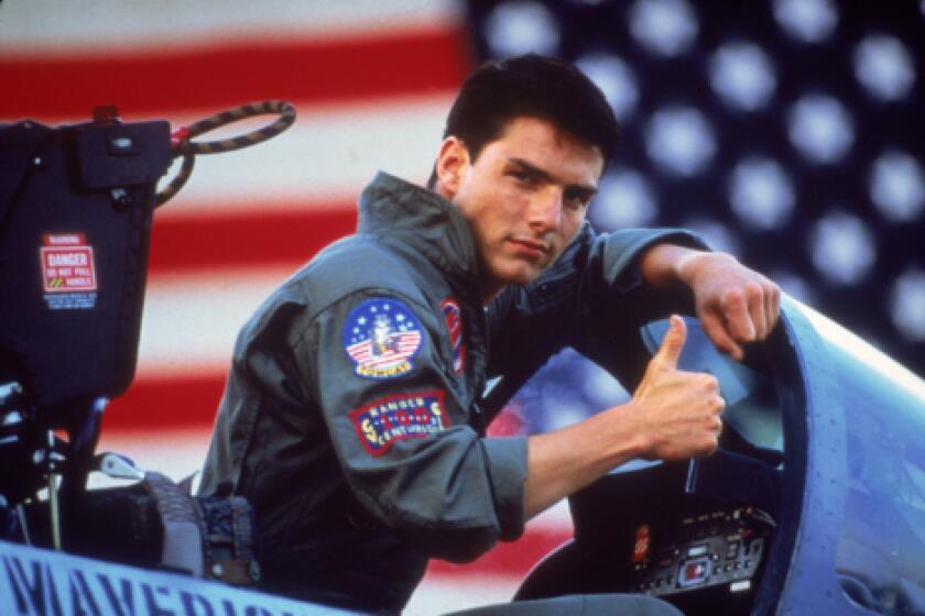 In this undated film publicity image released by Paramount Pictures, Tom Cruise is shown in a promotional image for the 1986 film, "Top Gun."
