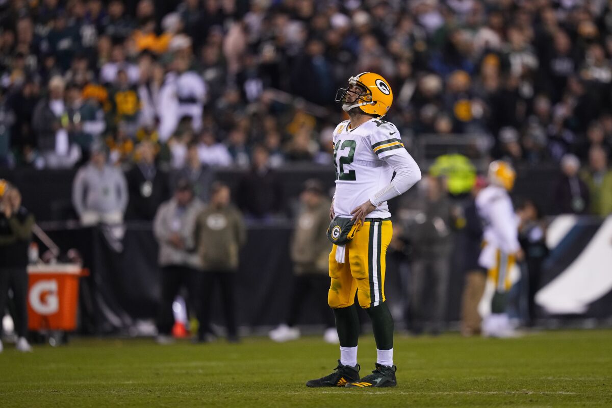 Green Bay Packers quarterback Aaron Rodgers reacts during the second half of an NFL football game against the Philadelphia Eagles, Sunday, Nov. 27, 2022, in Philadelphia. (AP Photo/Matt Slocum)