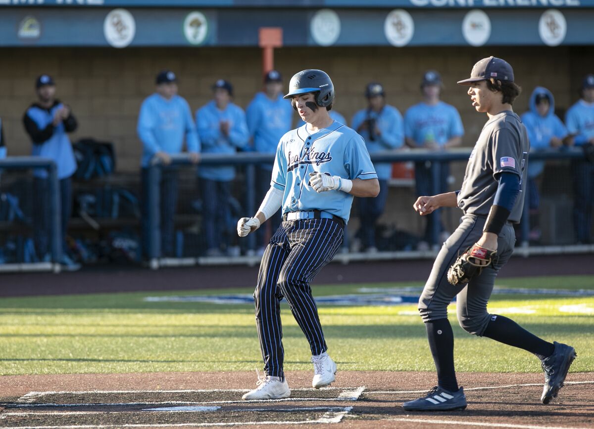 Corona del Mar's Van Sidebotham scores on a passed ball in the fourth inning against Newport Harbor on Friday.