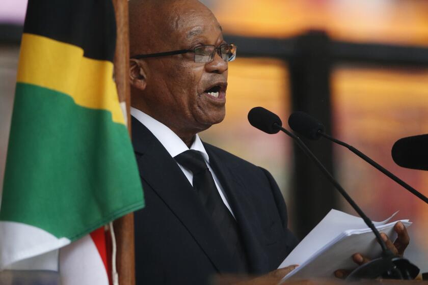 South African President Jacob Zuma speals at Nelson Mandela's memorial service in the Johannesburg township of Soweto.