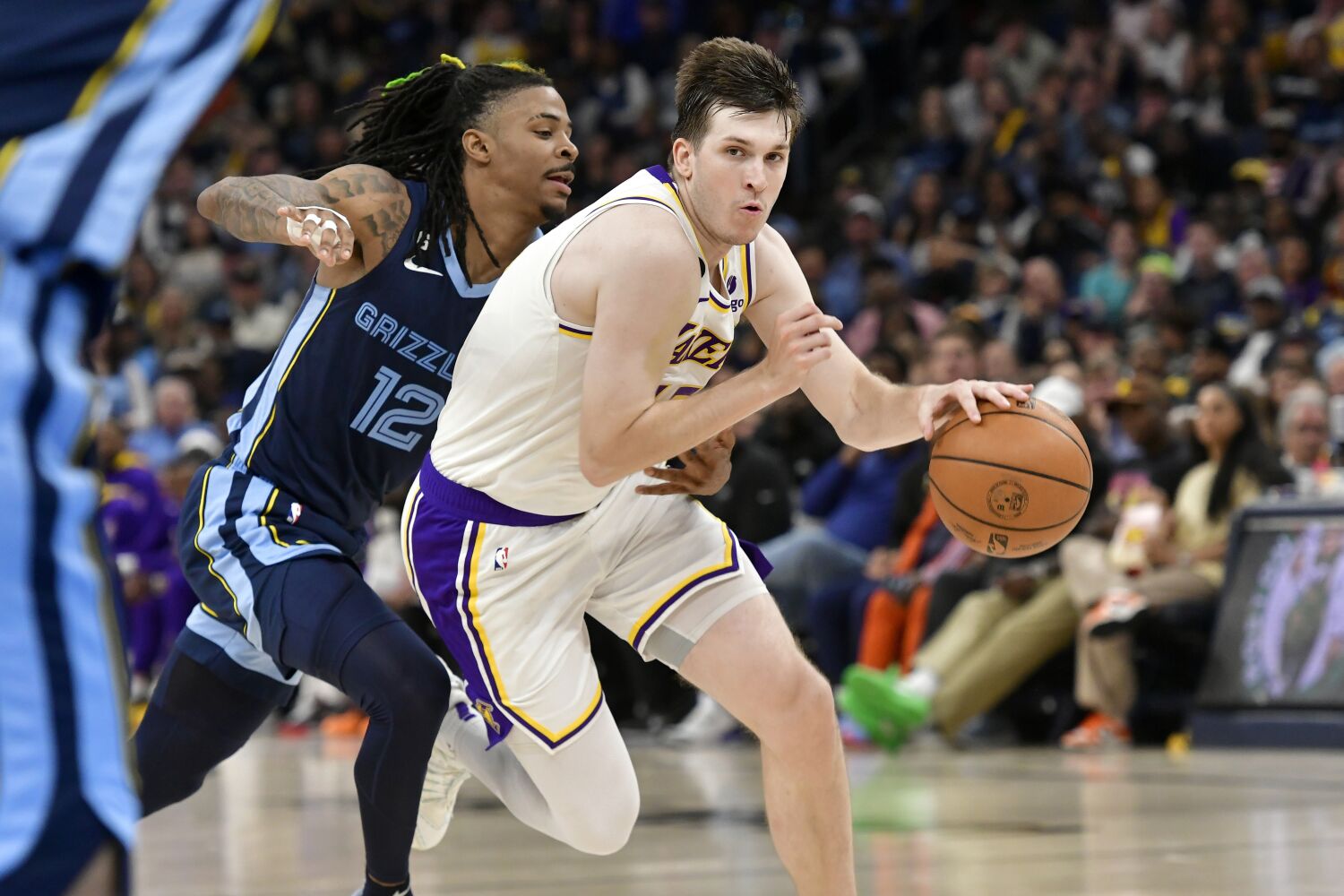 Austin Reaves helps spark Lakers' win over Grizzlies in series opener