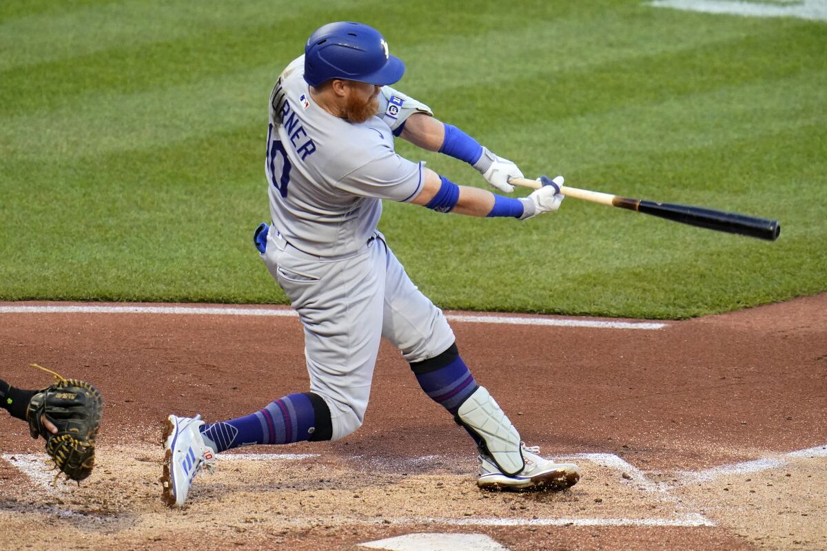 Dodgers' Justin Turner doubles off Pittsburgh Pirates pitcher Bryse Wilson, driving in two runs.