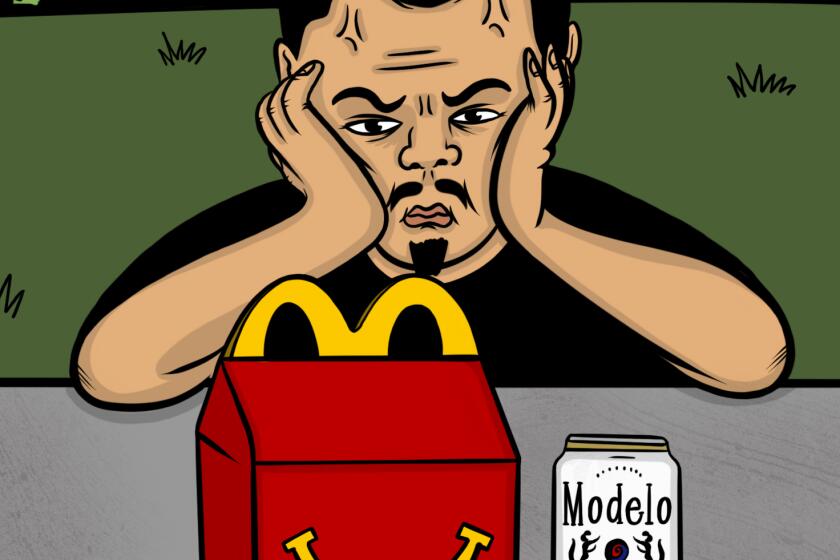 Angry man looking at a mcdonalds happy meal box 