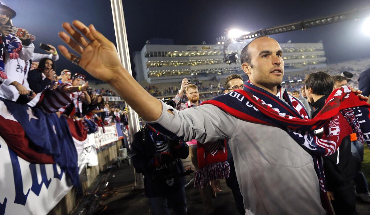 Landon Donovan celebrates with fans after playing for the U.S. national team in an exhibition against Ecuador last week.