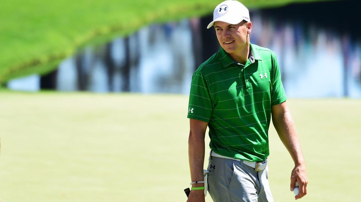 Jordan Spieth walks across the 16th green during a practice round prior to the start of the 2017 Masters Tournament on Tuesday.