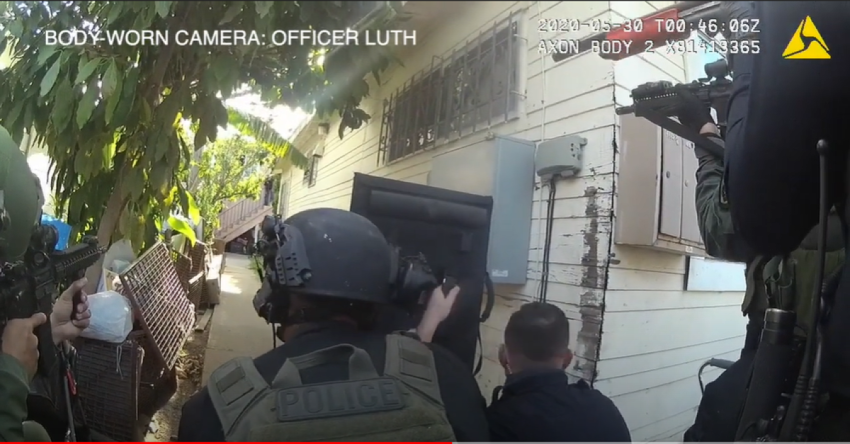 San Diego police released body camera video of officers fatally shooting a homicide suspect in City Heights on May 29.