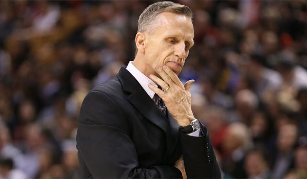 Mike Dunlap, shown coaching the Charlotte Bobcats in 2013, is the new coach at Loyola Marymount.