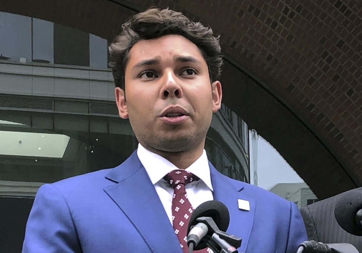 FILE - Fall River Mayor Jasiel Correia speaks outside the federal courthouse in Boston after his appearance on bribery, extortion and fraud charges on Sept. 6, 2019. On Monday, Nov. 28, 2022, a federal appeals court upheld the extortion and fraud convictions of the once-celebrated young Massachusetts mayor who was found guilty of extorting hundreds of thousands of dollars from marijuana businesses. (AP Photo/Philip Marcelo, File)