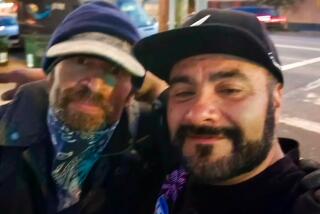 Shawn Alvarez and David Herrera stand together in a selfie taken by Herrera. The two reconnected this year when Alvarez was homeless.
