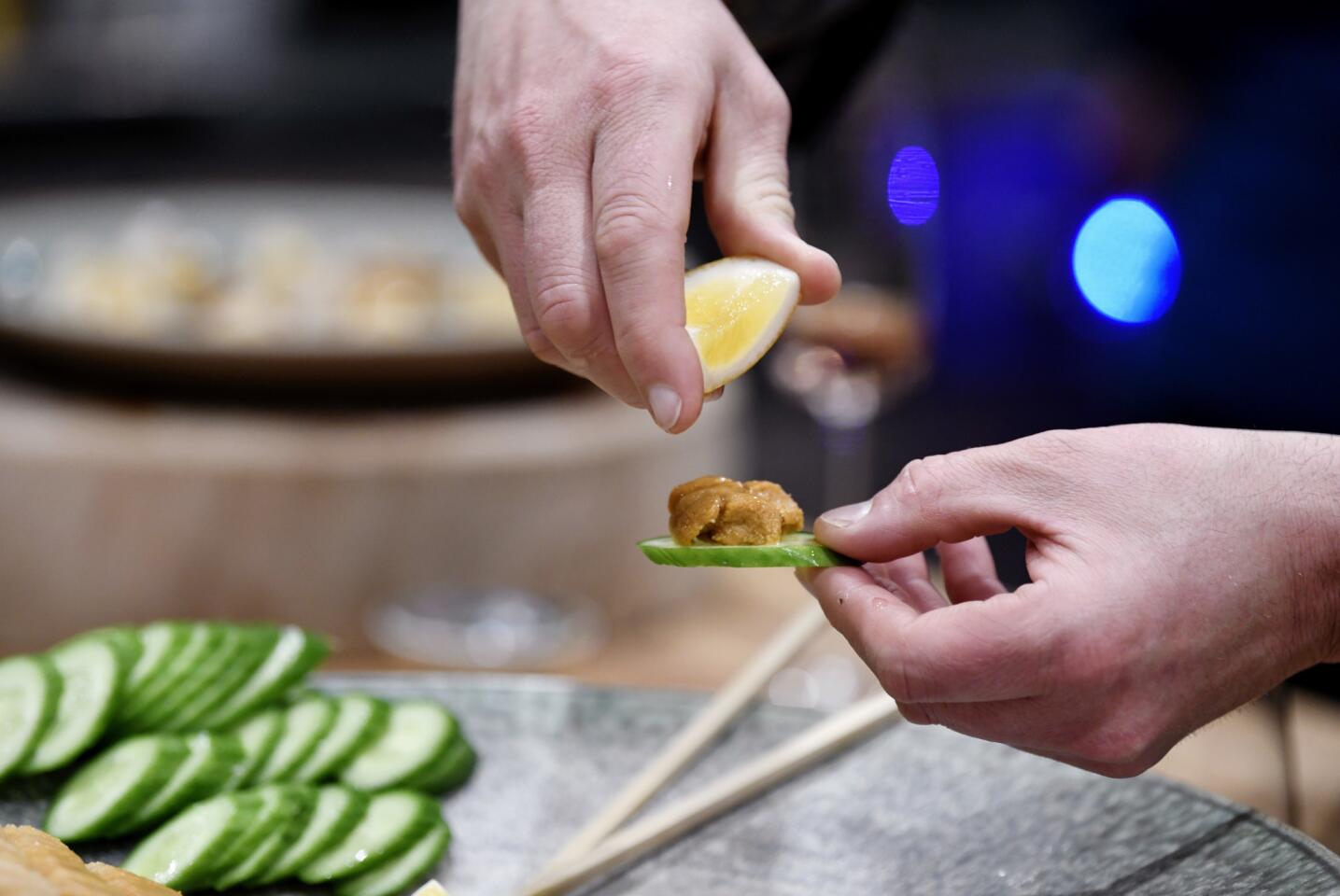 Mother and son make food for Lunar New Year