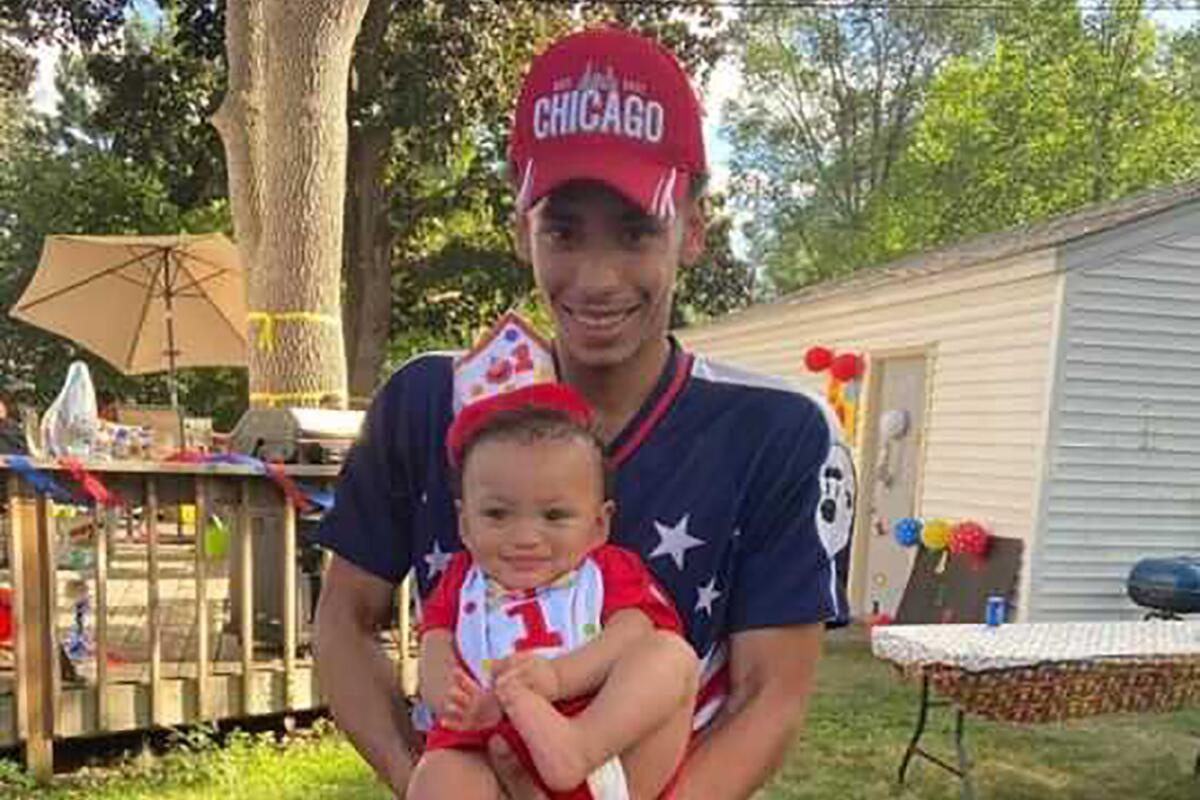 Daunte Wright poses with his son, Daunte Jr.