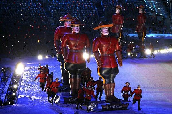 Inflatable figures of Royal Canadian Mounted Police officers are guided by performers dressed as Mounties, providing a singularly Canadian image to the Vancouver 2010 Winter Olympics closing ceremony Sunday night.