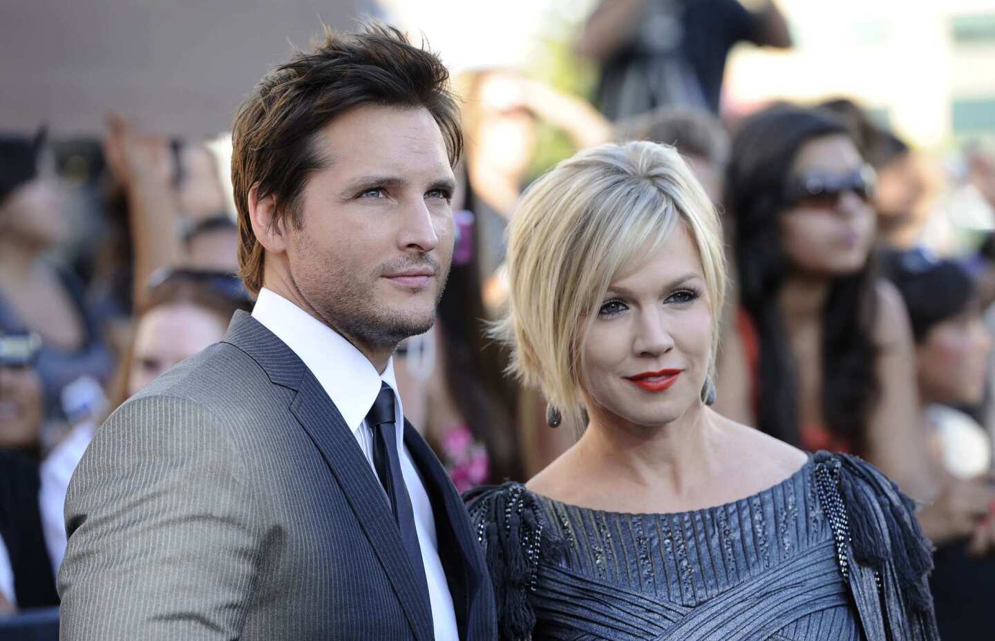 Jennie Garth and Peter Facinelli are calling it quits after 11 years of marriage. The "90210" meets "Twilight" couple filed for divorce, but remain amicable and dedicated to raising their three daughters together. Rumors surfaced shortly after the announcement that Facinelli was cheating, but the couple says it simply isn't true. "There are rumors out there which are completely untrue and hurtful to our family," they said in a joint statement Wednesday. "We just want to make it very clear -- there are no third parties involved."
