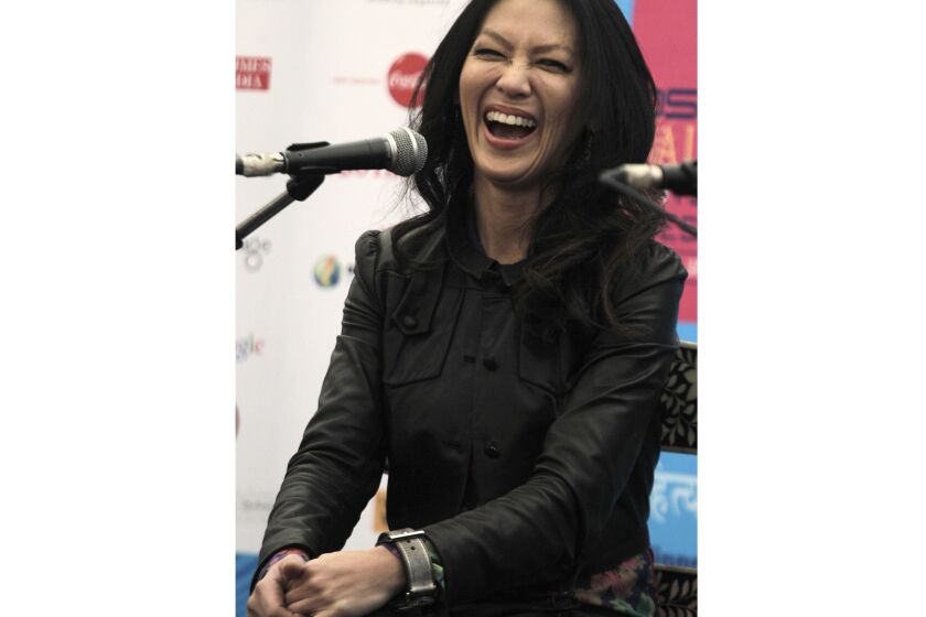 Author Amy Chua laughs as she talks about her book "Tiger Mother" at the Jaipur Literature Festival in Jaipur, in the western Indian state of Rajasthan, India, Jan. 21, 2012. Chua, the Yale Law School professor and author, has written her first novel. “The Golden Gate," a murder mystery centered around a wealthy family in Berkeley, California in 1944, will come out Sept. 19. Chua said in a statement released Monday, Feb. 6, 2023 by St. Martin's Publishing Group that she drew upon memories of growing up in El Cerrito, across the bay from “glamorous San Francisco.” (AP Photo/Manish Swarup, file)