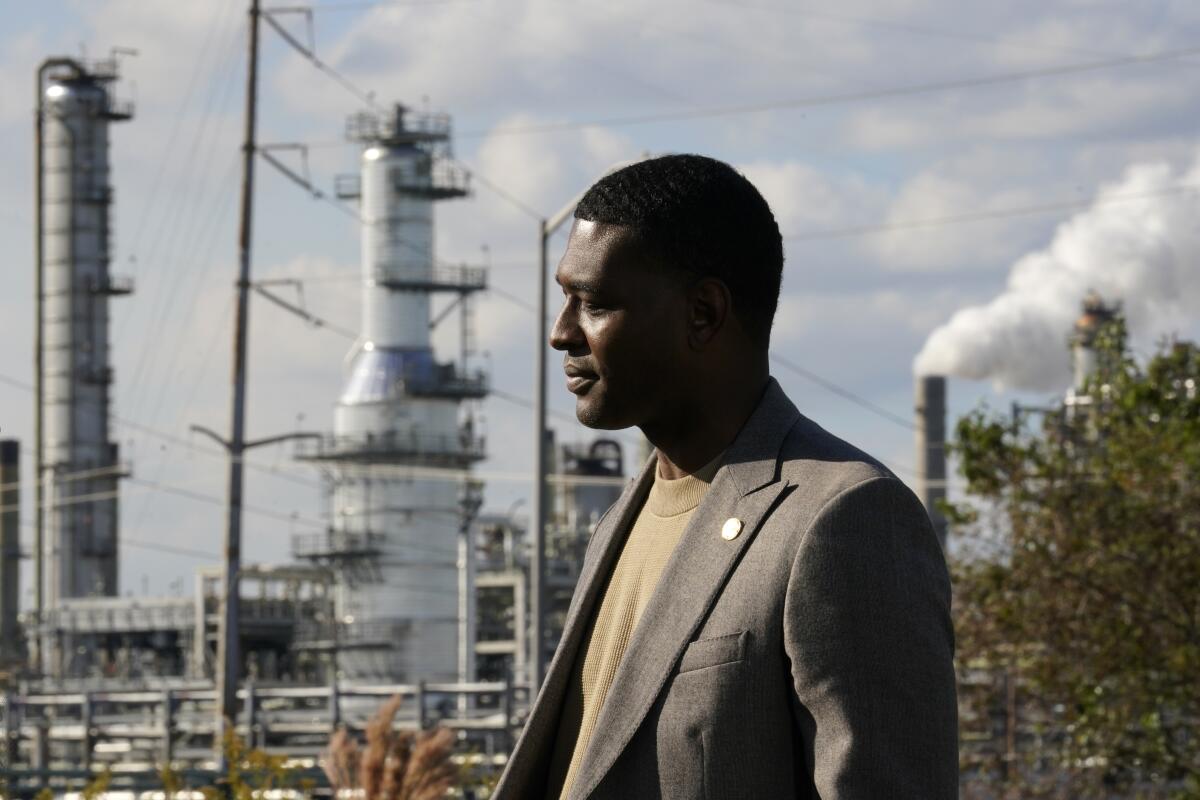 EPA Administrator Michael Regan stands near the Marathon Petroleum Refinery.