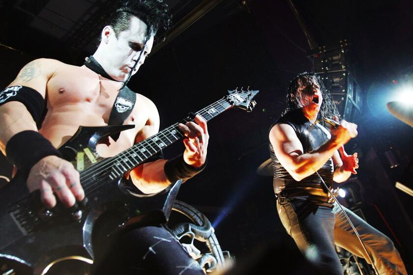 NEW YORK - MARCH 1: Glenn Danzig (R) and Doyle von Frankenstein (L) of punk band The Misfits perform onstage at Spirit March 1, 2005 in New York City. (Photo by Scott Gries/Getty Images)