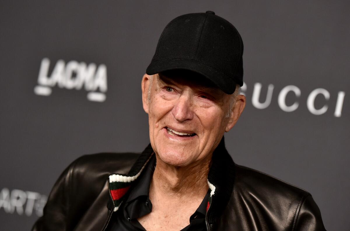 Artist Robert Irwin in a black leather jacket and cap.