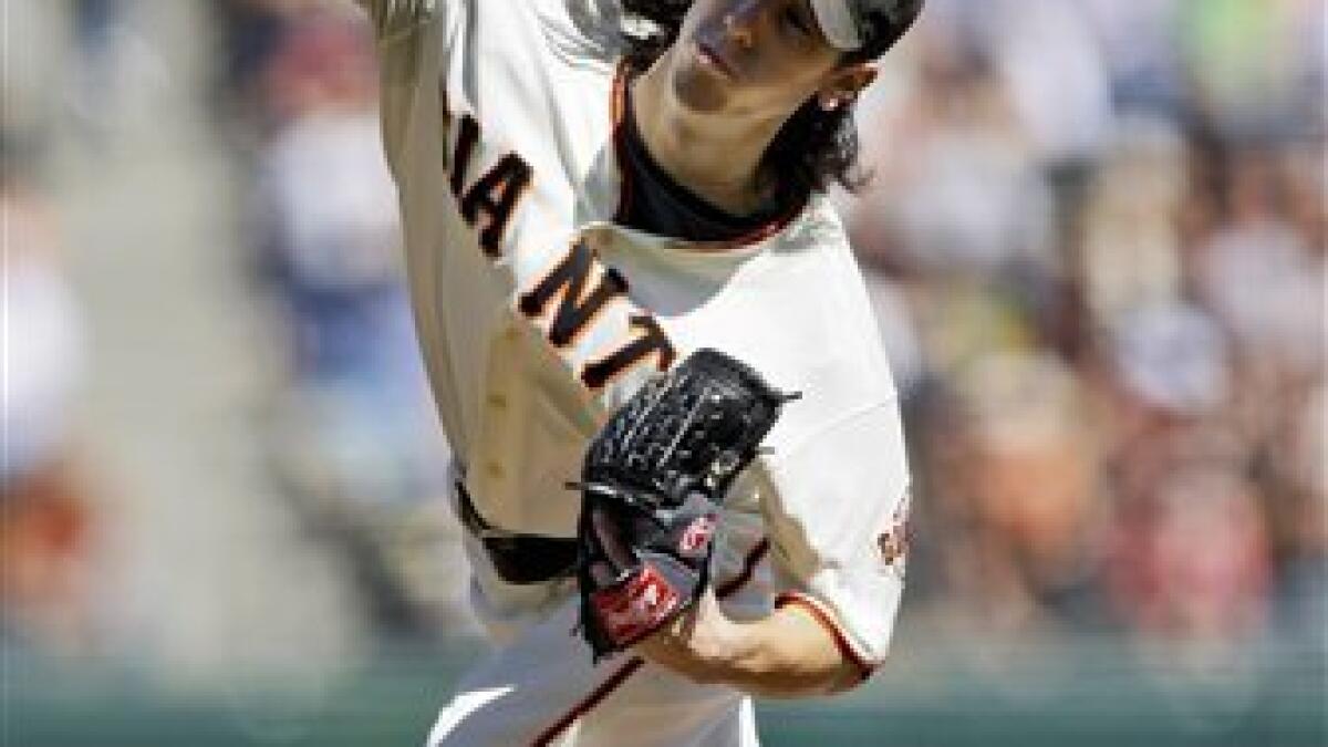 San Francisco Giants starting pitcher Tim Lincecum works against the Los  Angeles Dodgers' in the first inning of a baseball game on Sunday, Sept.  20, 2009, in Los Angeles, Calif. (AP Photo/Keith