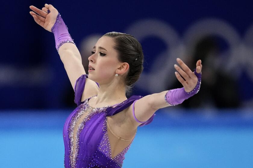 Kamila Valieva competes in the women's short program at the 2022 Beijing Winter Olympics.