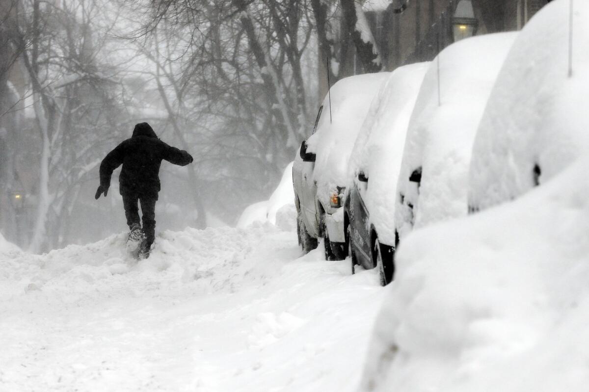 The National Weather Service reports that at least 58.5 inches of snow have fallen on Boston since Feb. 1, making this the snowiest month in the city's history.