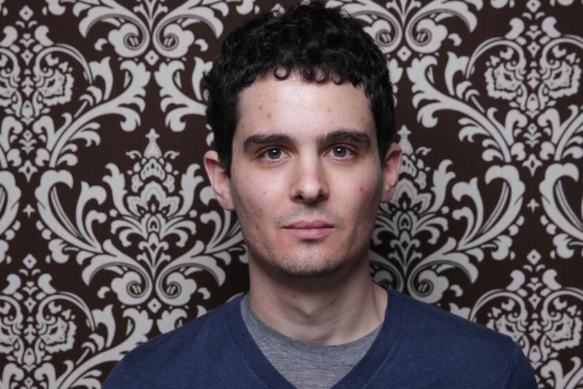 "Whiplash" director Damien Chazelle is in talks to direct "First Man," about astronaut Neil Armstrong.