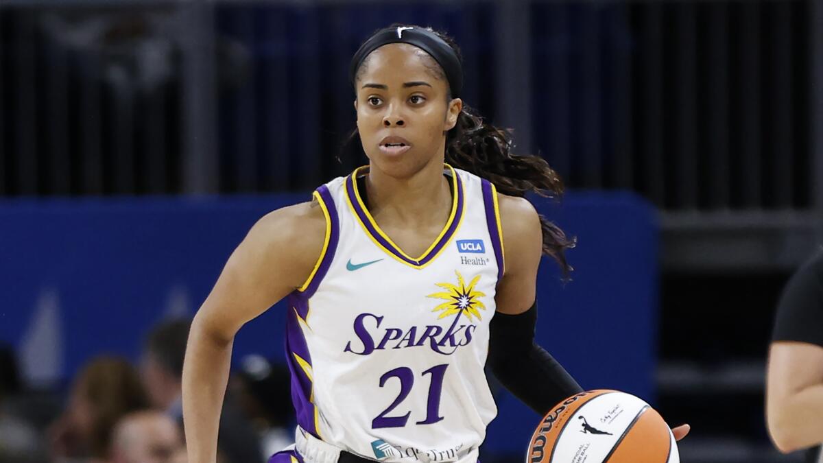 Sparks guard Jordin Canada brings the ball up court against the Chicago Sky.