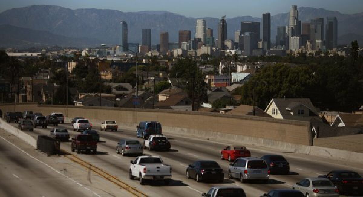 Traffic travels north on the Harbor Freeway in Los Angeles. Vehicles are one source of fine particle air pollution.