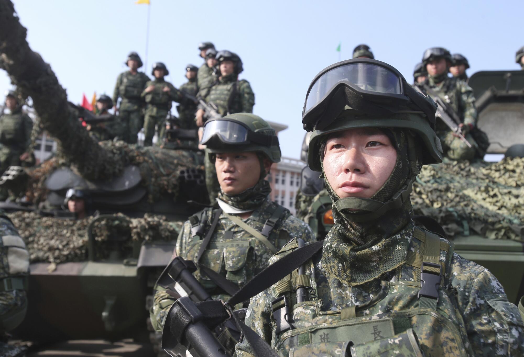 Taiwan's active-duty military has shrunk to 165,000 from 275,000 three years ago.