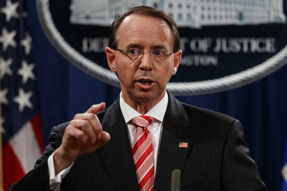 Deputy Atty. Gen. Rod Rosenstein outlines a new indictment Friday against alleged Russian hacks into Hillary Clinton campaign accounts.