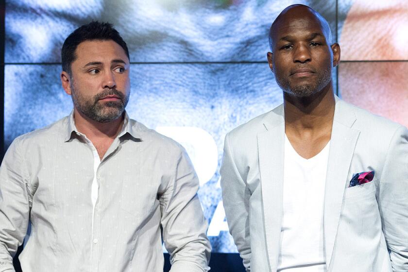 Oscar De La Hoya, left, and Bernard Hopkins attend the weigh-in of David Lemieux from Canada and Hassan N'Dam from France in Montreal, on June 19, ahead of their IBF middleweight championship fight.