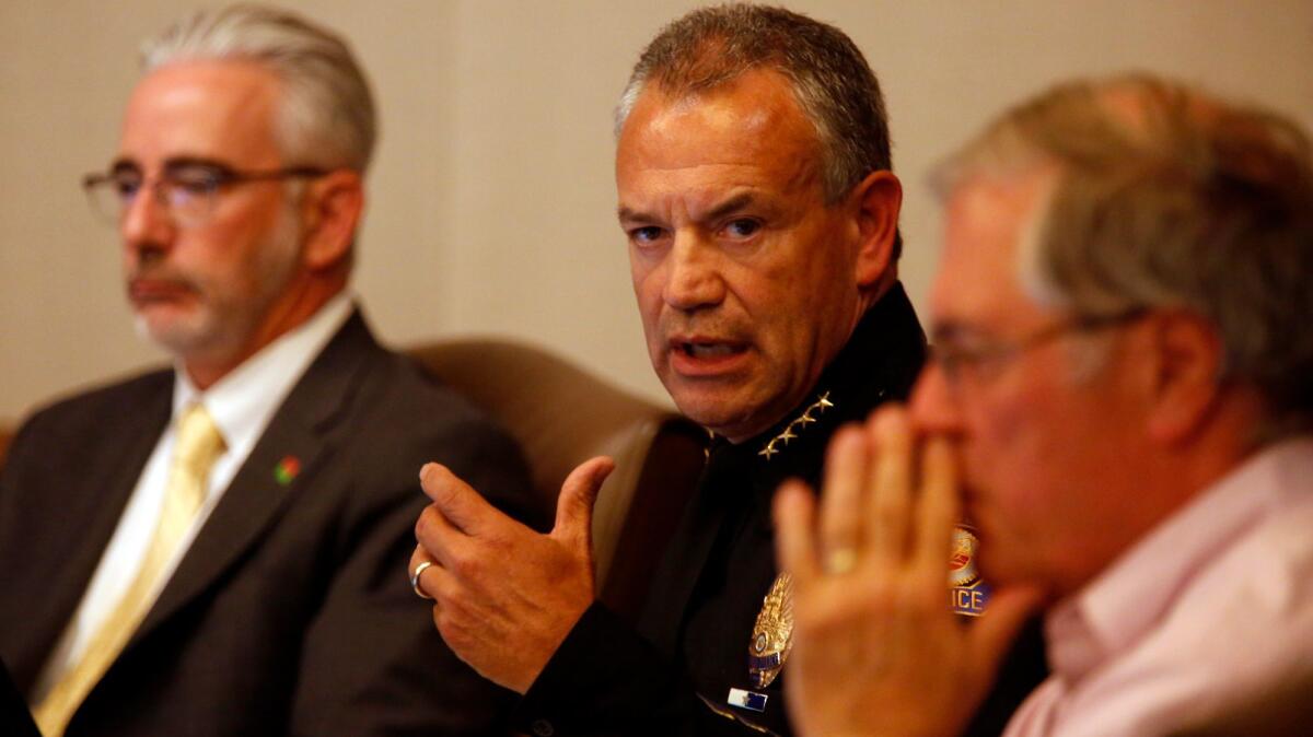 Pasadena Police Chief Phillip L. Sanchez, center, discusses with a City Council committee the department's handling of a 2016 drug overdose in then-USC dean Dr. Carmen Puliafito's hotel room.