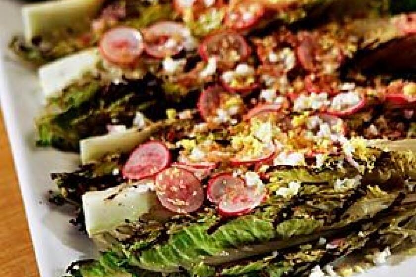 Grilled romaine with radishes, hard-boiled eggs and toasted bread crumbs