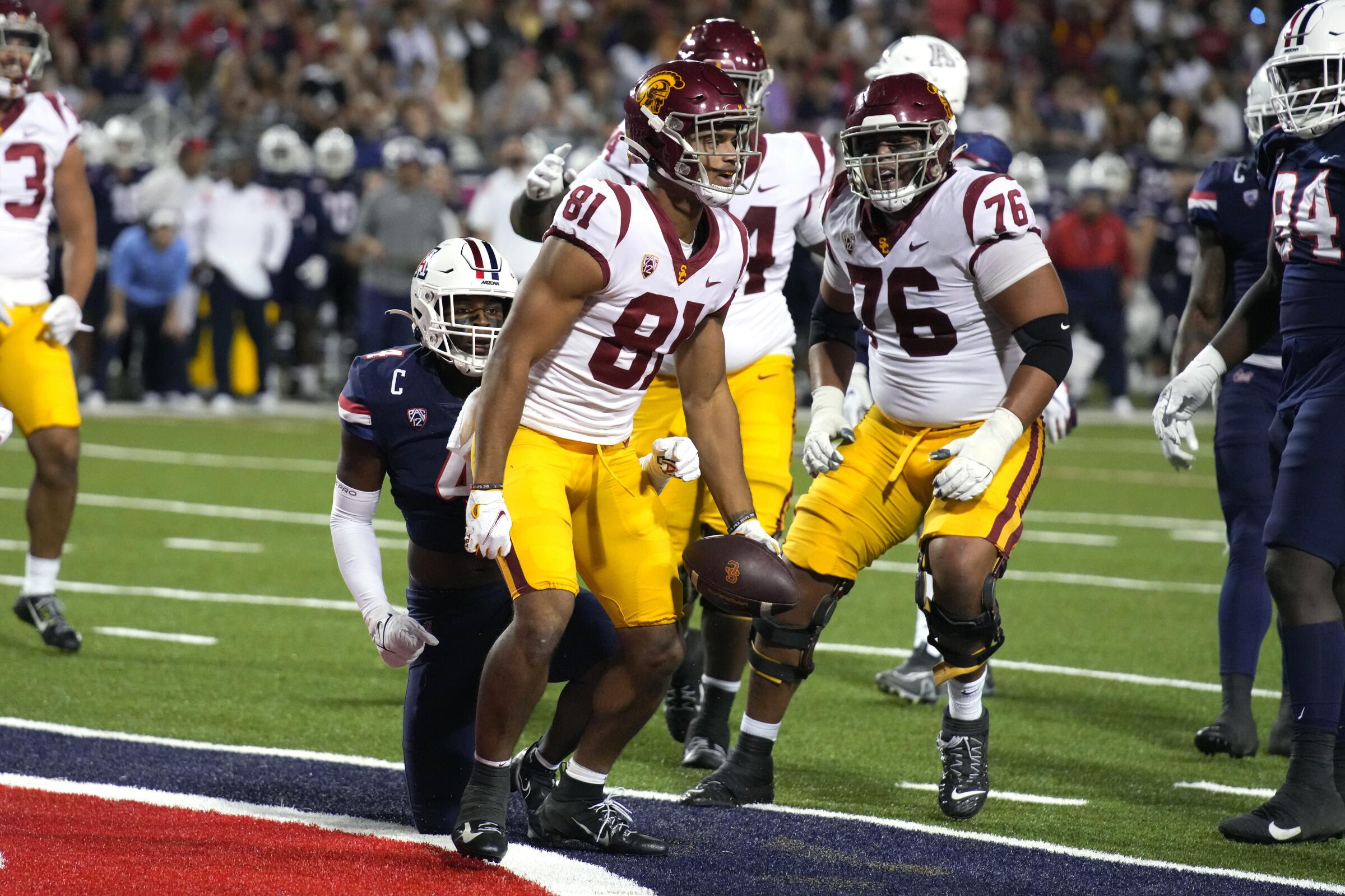 USC receiver Kyle Ford reacts after scoring a touchdown against Arizona 