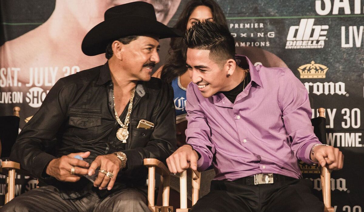 Jose Santa Cruz, left, shares a laugh with son, boxer Leo Santa Cruz, in 2016.