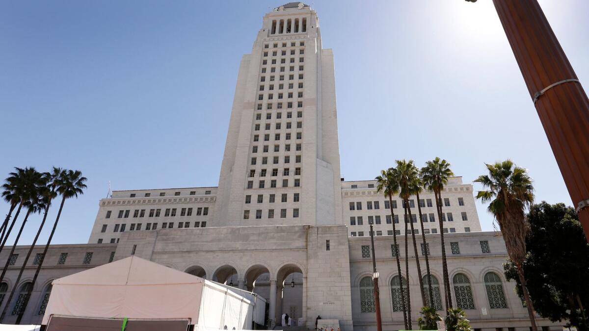 The city will pay $4.5 million to the family of a cyclist who was killed in Eagle Rock after he hit a rough patch of pavement on Colorado Boulevard and flipped three times. Above, Los Angeles City Hall.