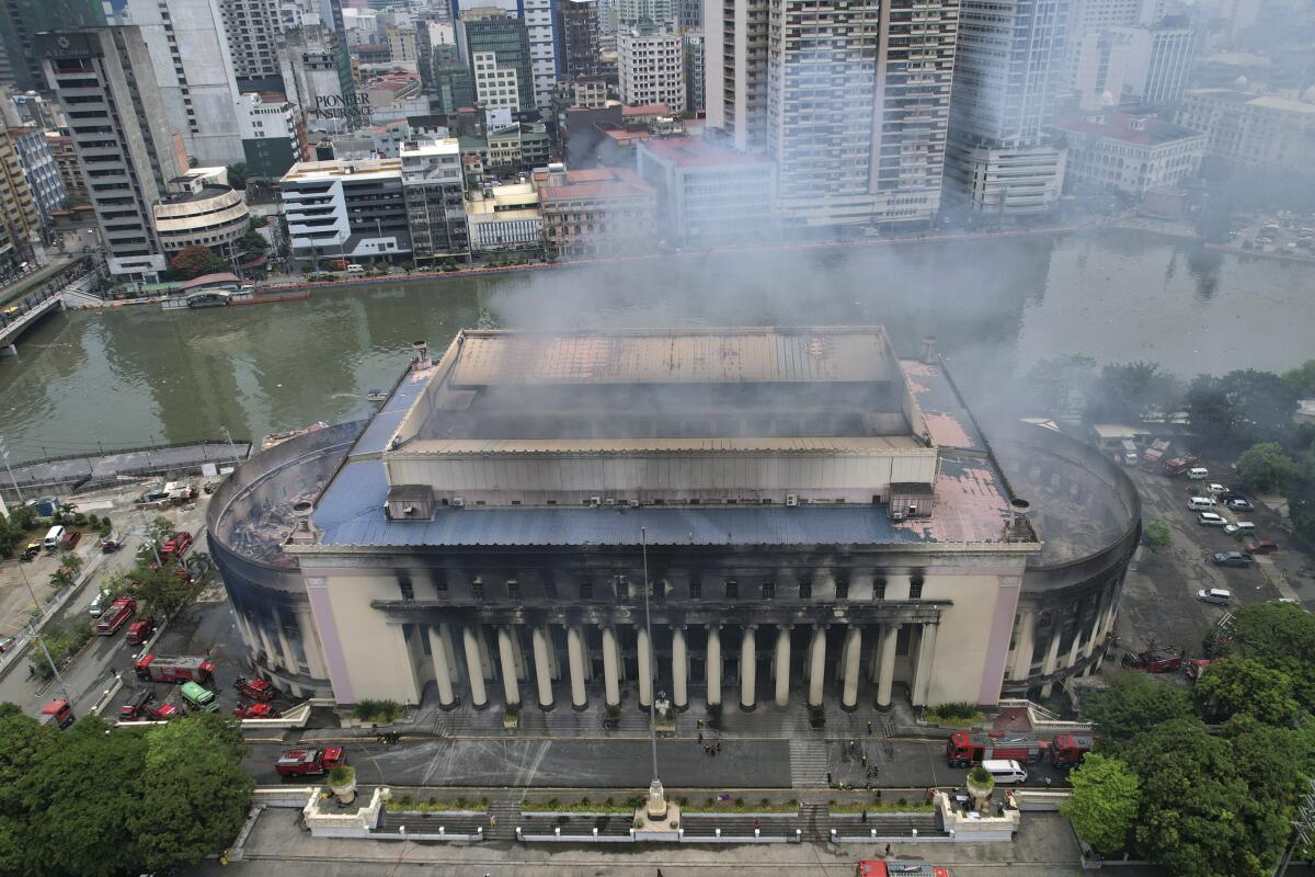 Smoke billowing from the Manila Central Post Office during a fire