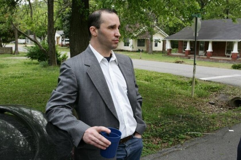 James Everett Dutschke waits for the FBI to arrive and search his home in Tupelo, Miss., in April, in connection with an investigation into poisoned letters sent to President Obama and others.