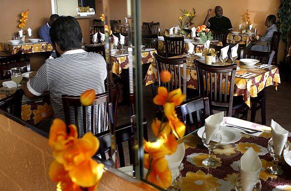 The warm, comfortable dining room at the Van Nuys outpost of Veronica's Kitchen, a restaurant that specializes in Nigerian cuisine.