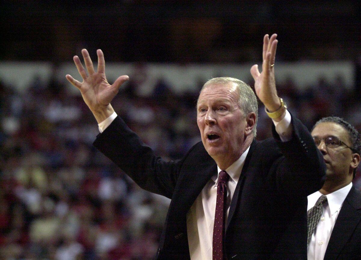Coach Steve Fisher reacts to an official's call during the 2002 Mountain West tournament title game.