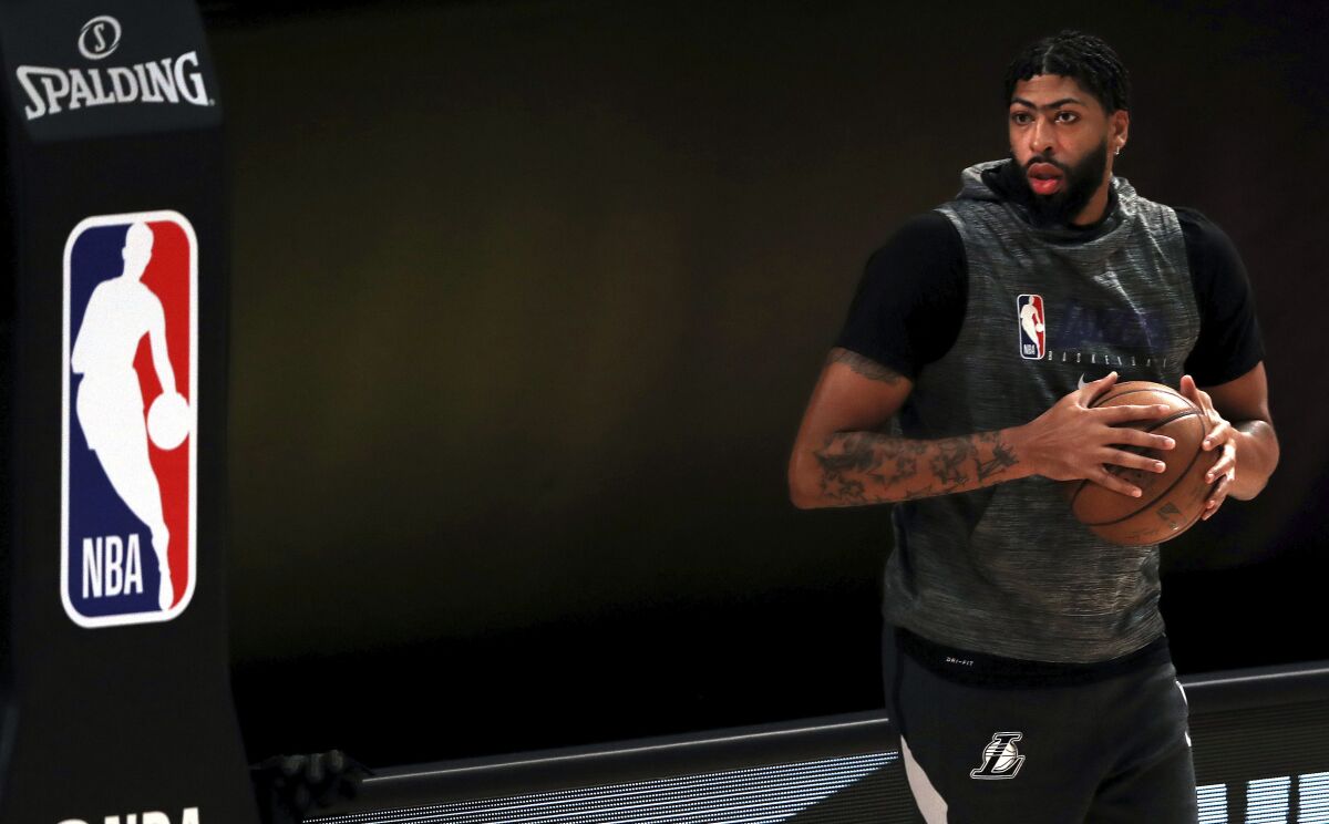 The Lakers' Anthony Davis warms up prior to a game against the Clippers.