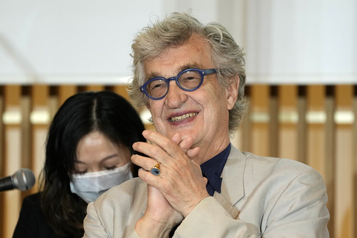 Filmmaker Wim Wenders smiles during a press gathering for The Tokyo Toilet art project in Tokyo, Wednesday, May 11, 2022. Wenders is making a film about beatified Japanese toilets that will have what the German director calls “social meaning” about people in modern cities. (AP Photo/Shuji Kajiyama)