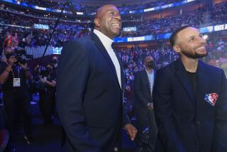 NBA Legends, Magic Johnson and Stephen Curry smile during 71st NBA All-Star Game as part of 2022 NBA All Star Weekend