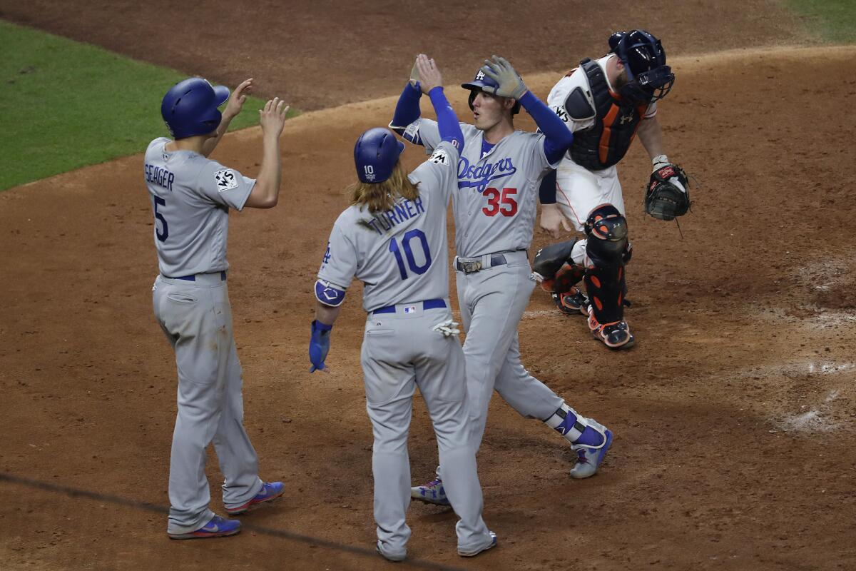 Cody Bellinger celebrates his home run in the fifth inning of Game 5 of the World Series.