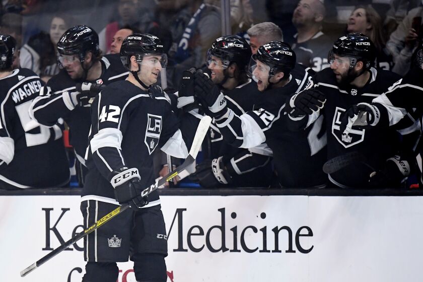Los Angeles Kings center Gabriel Vilardi celebrates his goal with teammates on the bench during the first period of an NHL hockey game against the Florida Panthers Thursday, Feb. 20, 2020, in Los Angeles. (AP Photo/Mark J. Terrill)
