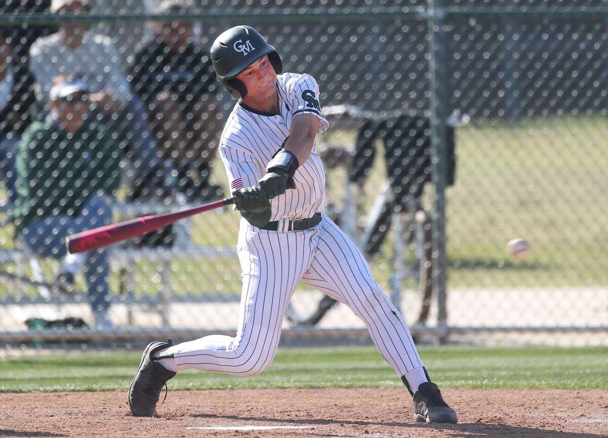 Costa Mesa's Wylan Rottschafer hits a solid single against Estancia on Friday.